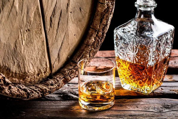 Glass of whisky in the old cellar — Stock Photo, Image