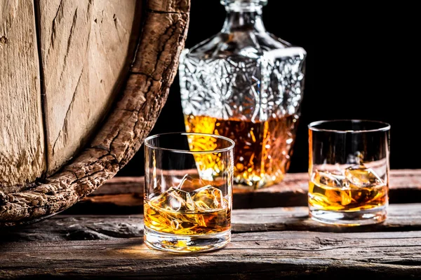 Two glasses of good whisky with ice — Stock Photo, Image