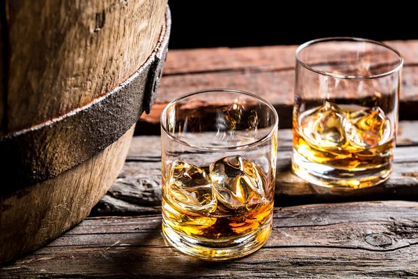 Glass of whiskey in the old cellar — Stock Photo, Image