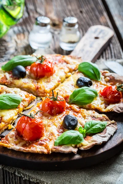 Close-up on freshly baked mini pizzas — Stock Photo, Image