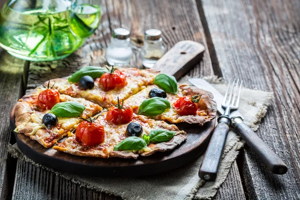 Freshly baked pizza with cheese — Stock Photo, Image