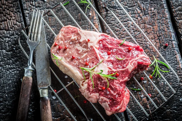 Fresh piece of beef with herbs — Stock Photo, Image