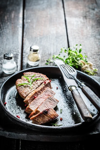 Hot meat with rosemary and papper ready to eat — Stock Photo, Image