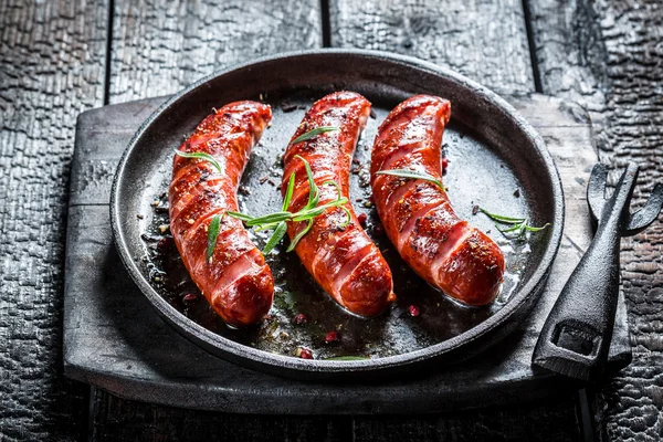 Grilled sausage with fresh rosemary