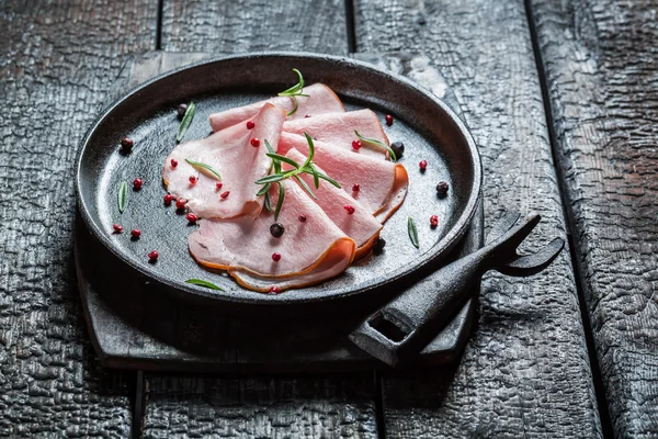 Fresh ham with herbs and pepper — Stock Photo, Image