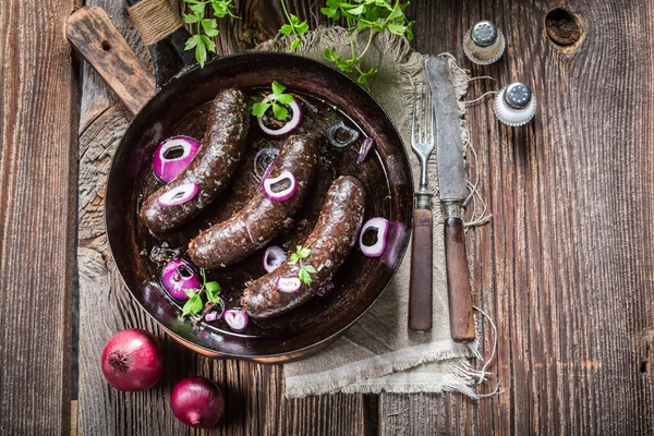 Homemade black pudding on pan — Stock Photo, Image