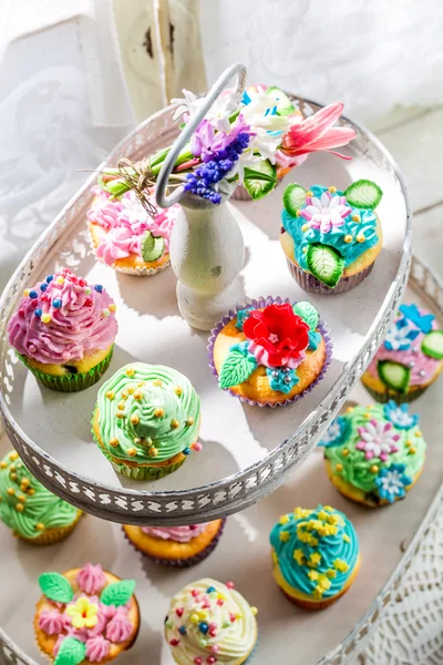 Sweet muffins with sweet decoration — Stock Photo, Image