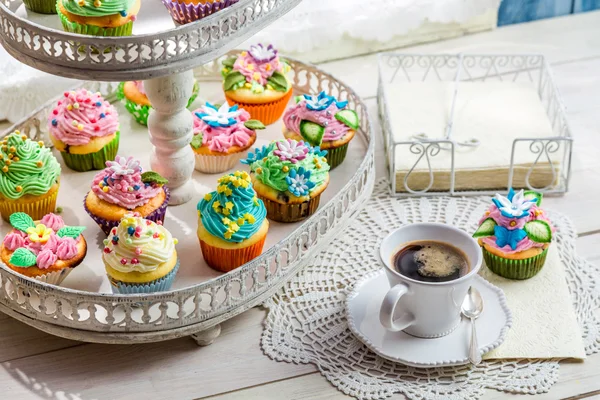 Delicious muffins with sweet decoration — Stock Photo, Image