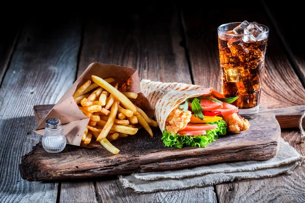 Fresh kebab with cod drink and fries — Stock Photo, Image