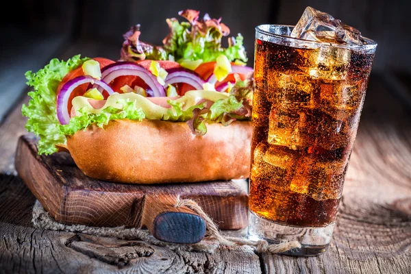 Homemade hot dog with sausage and vegetables — Stock Photo, Image