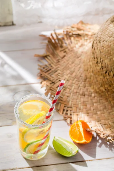 Tasty drink with lemon and orange — Stock Photo, Image