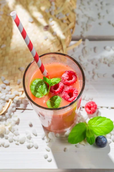 Yummy cocktail with fruits — Stock Photo, Image