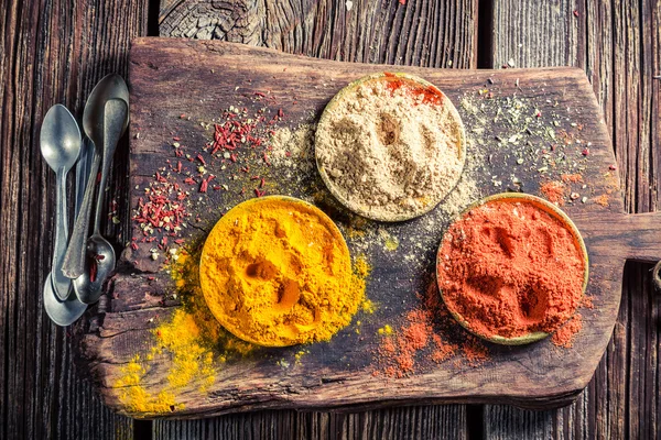 Good herbs and spices on old table — Zdjęcie stockowe