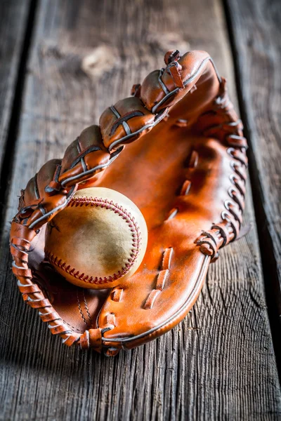 Closeup of old baseball glove and ball — Stock Fotó