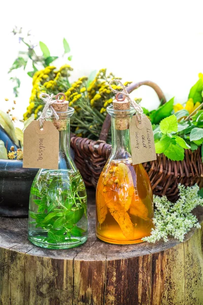 Healthy tincture with alcohol and herbs — Stock Photo, Image