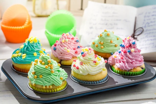 Preparation for sweet cupcakes with cream and decoration — Stock Photo, Image