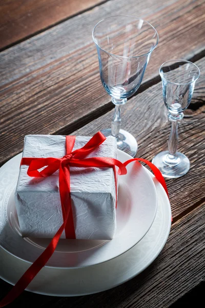 Beautiful presents on plate for Christmas — Stock Photo, Image