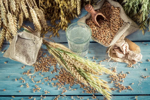 Fresh ingredients for bread and buns with several grains — Stock Photo, Image