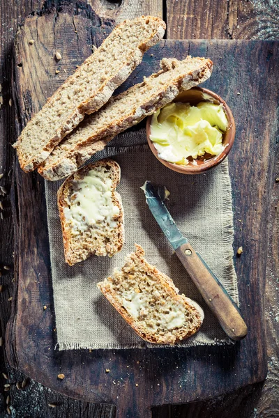 Delicious loaf of bread with whole grains for breakfast — Stock Photo, Image