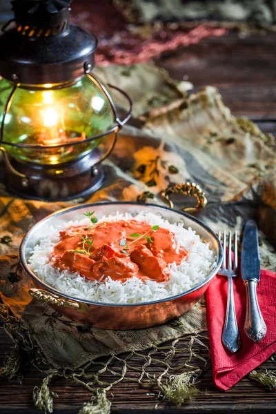 Tasty tikka masala with chicken in tomato sauce — Stock Photo, Image