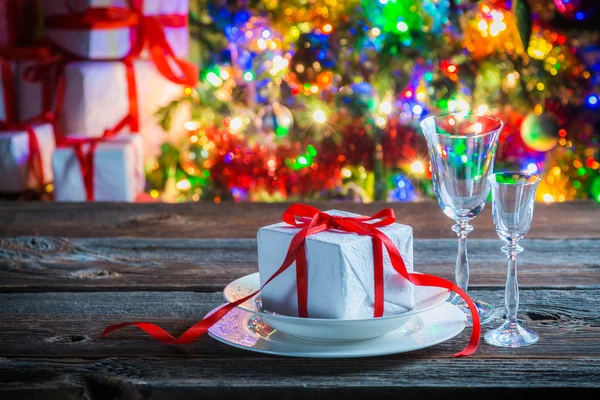 Beautiful gifts on plate for Christmas — Stock Photo, Image