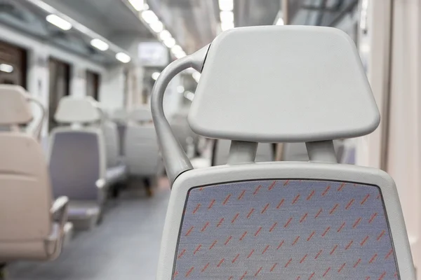 Close-up van de lege stoel in een woon-werkverkeer trein — Stockfoto