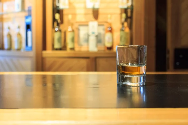 Whisky glass in a a bar — Stock Photo, Image