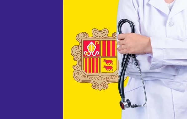 Female doctor with stethoscope in hand on the background of the Andorra flag. Concept medicine, pandemic in the country