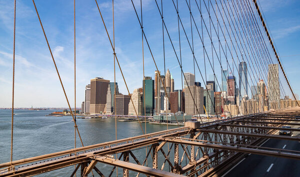 A picture of Lower Manhattan as seen from the Brooklyn Bridge.