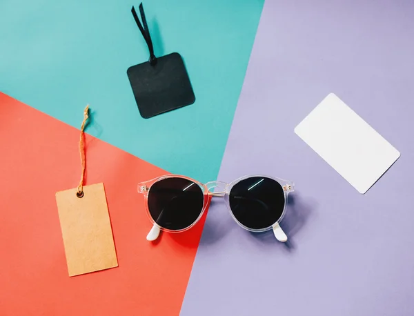 Fashionable sunglasses with blank tags — Stock Photo, Image