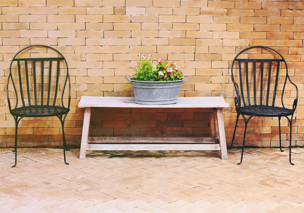 Outdoor chairs and flower — Stock Photo, Image