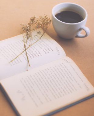 Book with black coffee