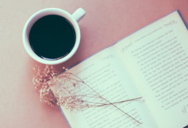 Book with black coffee