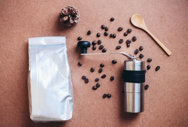 Coffee grinder and bag — Stock Photo, Image