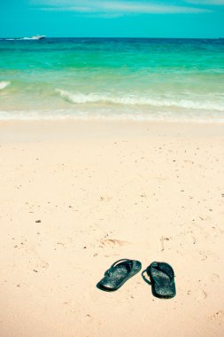 Kumsalda floplar flip