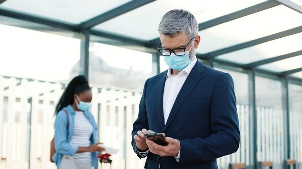 Portrait Caucasian Concentrated Senior Man Traveller Mask Standing Street Outdoors —  Fotos de Stock