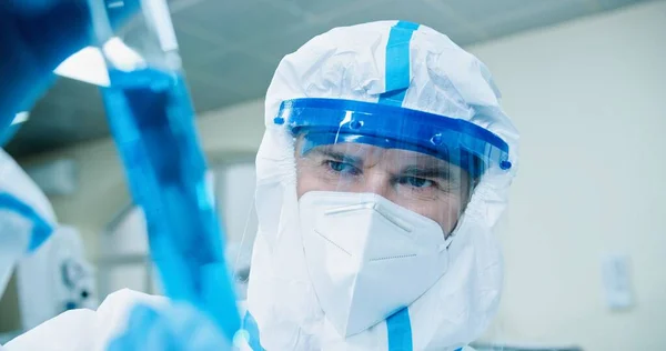 Close Caucasian Man Scientist Protective Suit Mask Face Shield Holding — Foto Stock