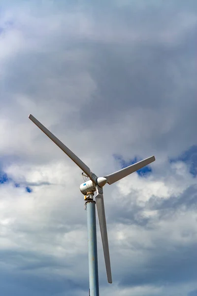 Wind turbine against blue sky.clean energy