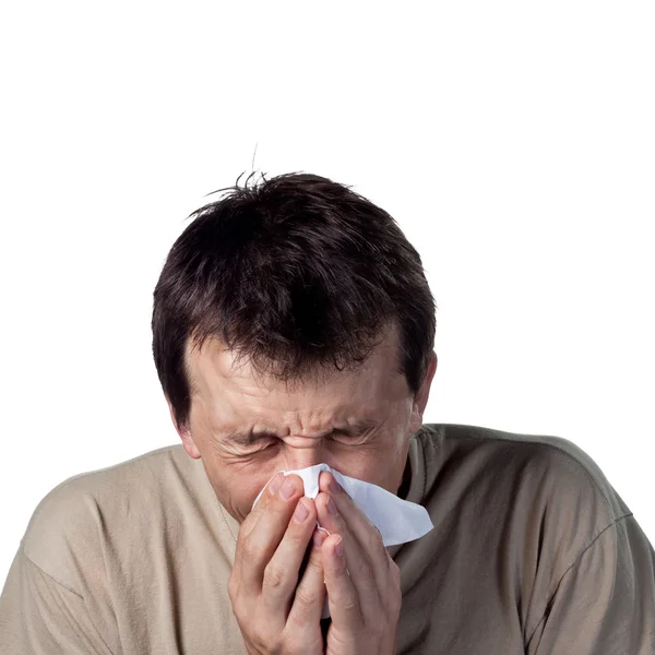 Joven estornudando — Foto de Stock