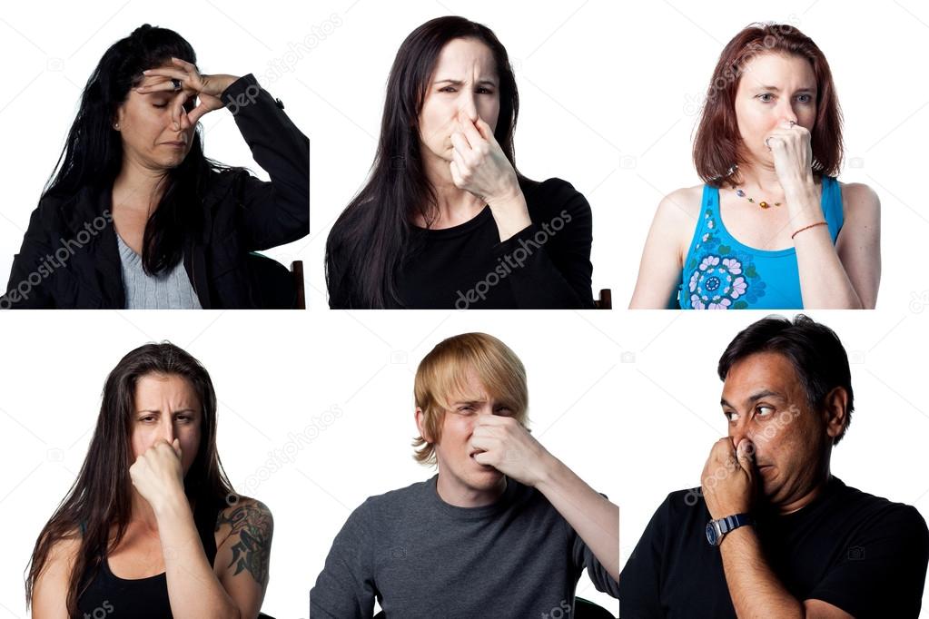Six people holding their noses