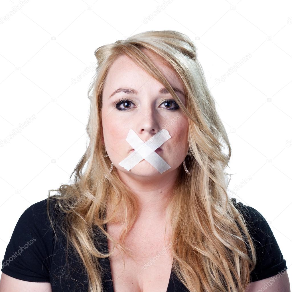 Woman with tape across her mouth