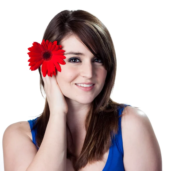 Woman with flowers in her hair — Stock Photo, Image