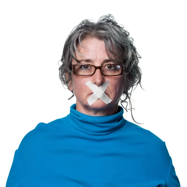 Woman with tape across  mouth — Stock Photo, Image