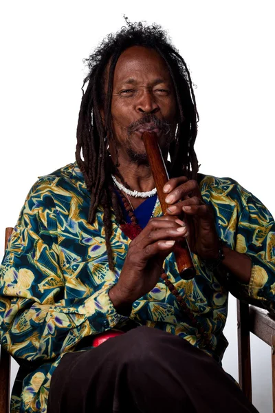 Rastafarian gra na flecie — Zdjęcie stockowe