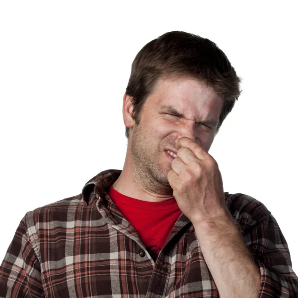 Man heeft betrekking op zijn neus — Stockfoto