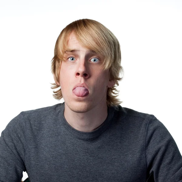 Man sticks his tongue out — Stock Photo, Image