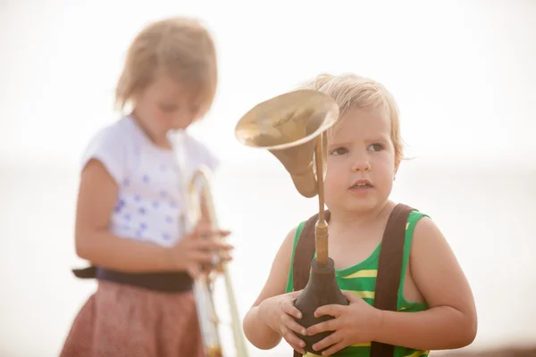 Children playing musical instruments — Stock Photo, Image