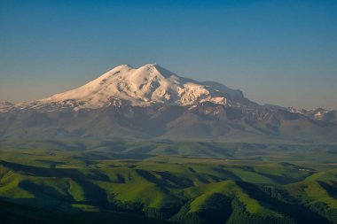 Elbrus mountain. View from the Bermamyt plateau at dawn.