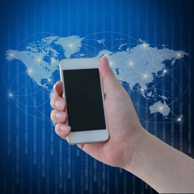 Cep telefonu Wolrd harita arka planda tutan el