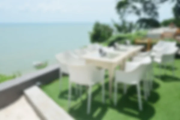 Blurred image Restaurant on the tropical beach — Stock Photo, Image